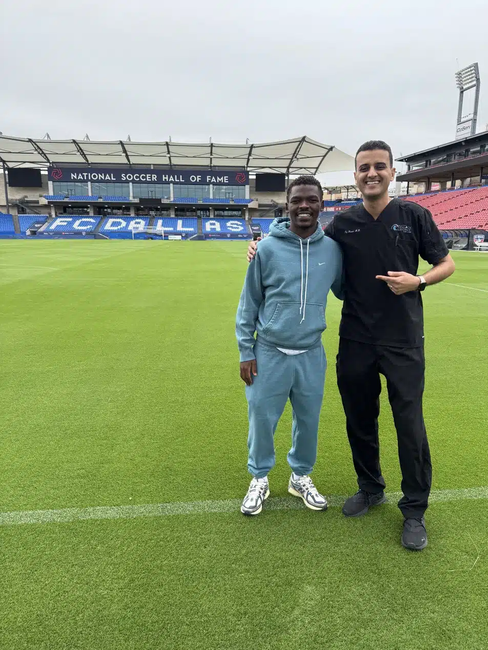 Tsiki Ntsabeleng with Dr. Nasser at FC Dallas stadium